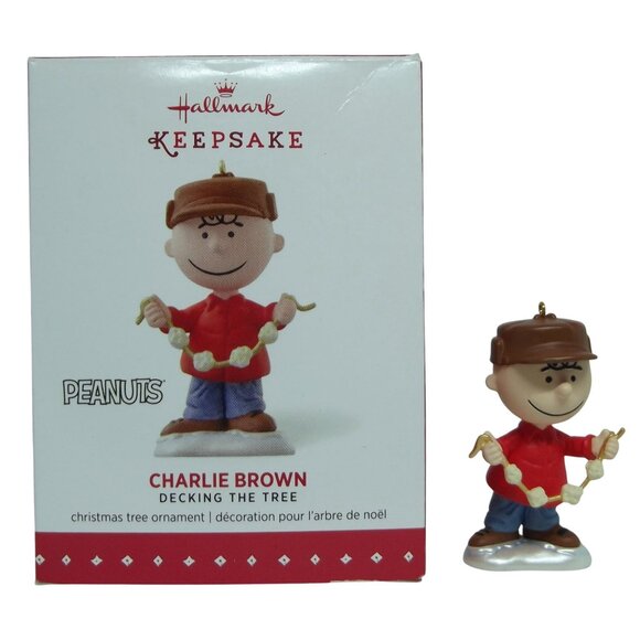 Hallmark Ornament 2015 Keepsake Peanuts Charlie Brown Decking The Tree - Picture 1 of 9